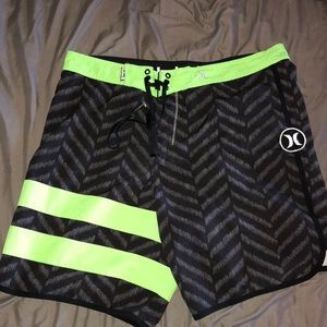 Black green Hurley board shorts
